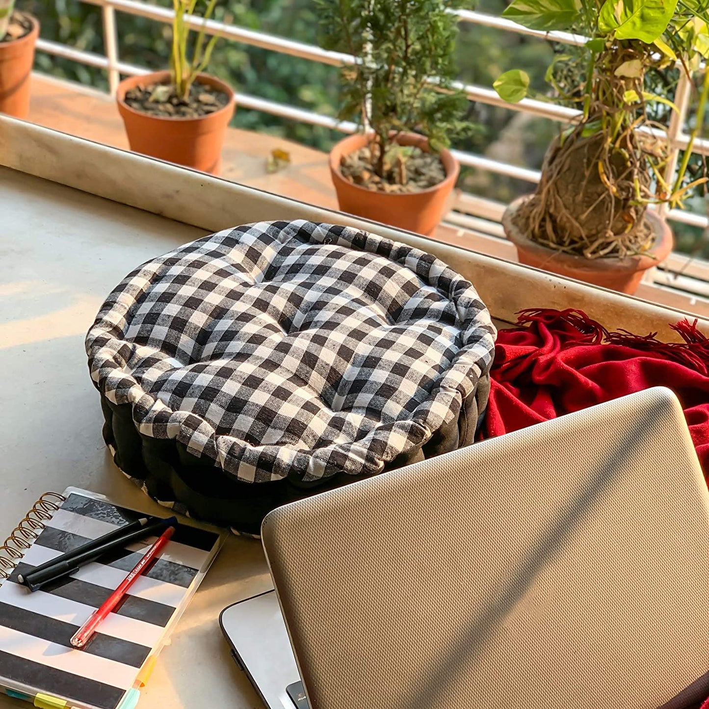 White gingham round cushion