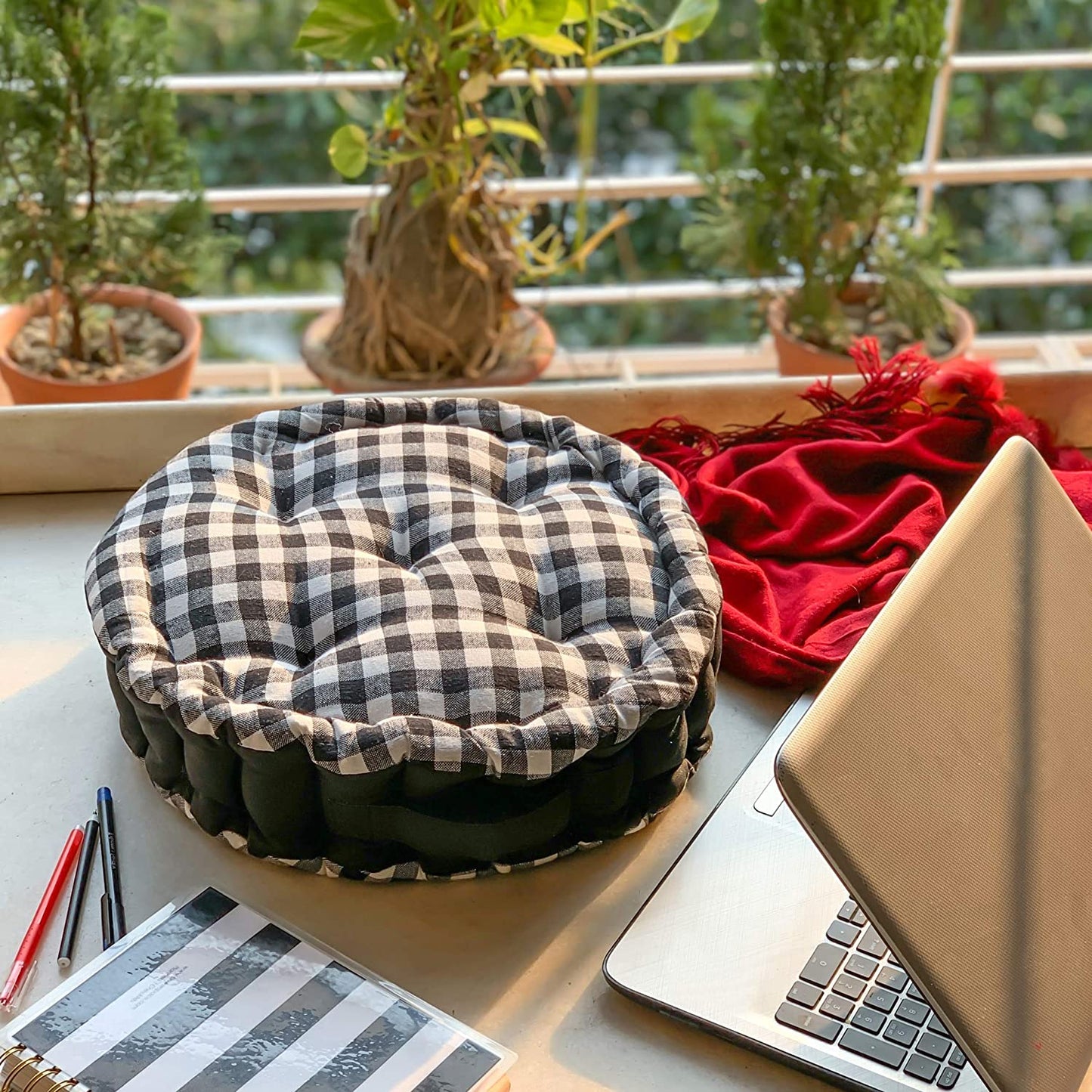 White gingham round cushion